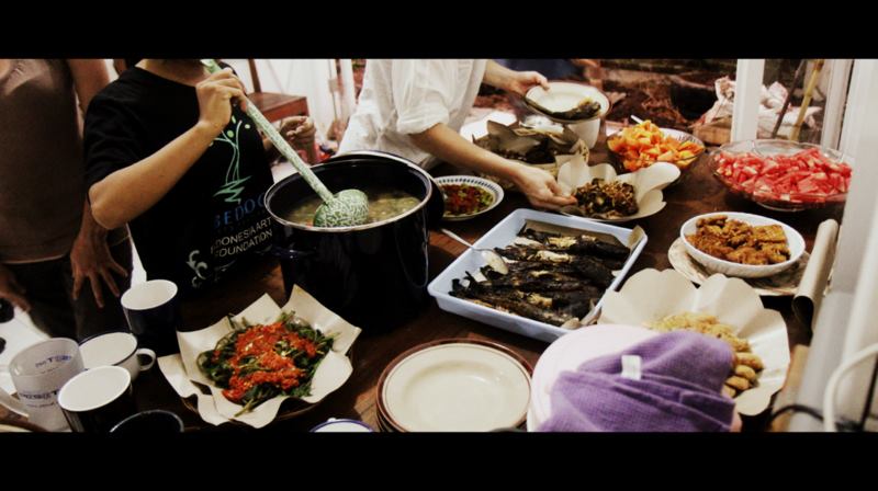 After working all day in the garden, everyone shares a meal made by the kitchen team- Paul Daley 15