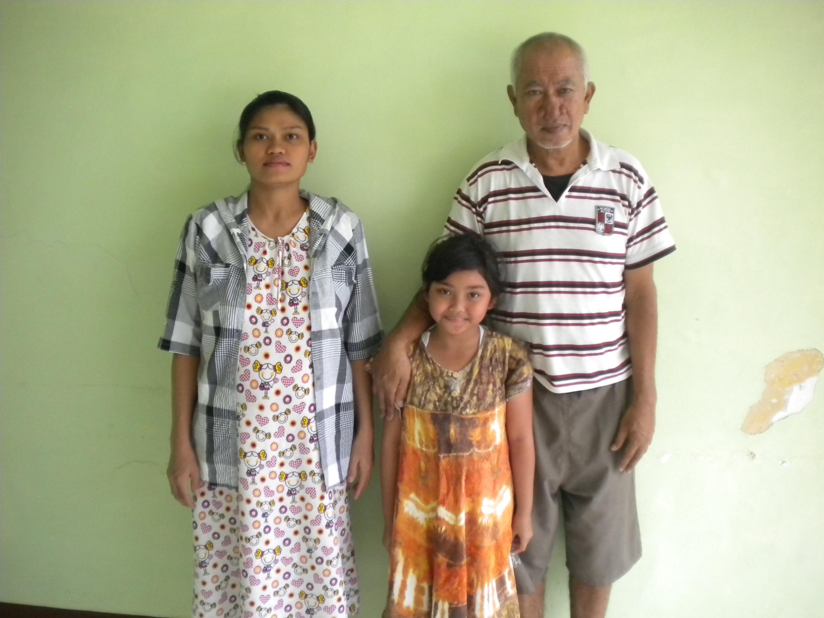 A Cambodian refugee with his daughter and Indonesian wife - Credit: Antje Missbach